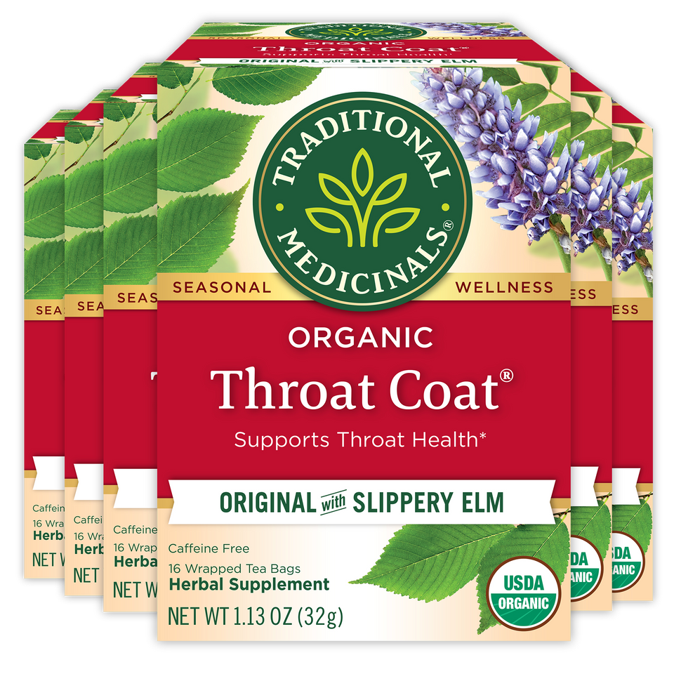 Packaging of Traditional Medicinals Organic Throat Coat Tea with an image of slippery elm and flowers, indicating it supports throat health.