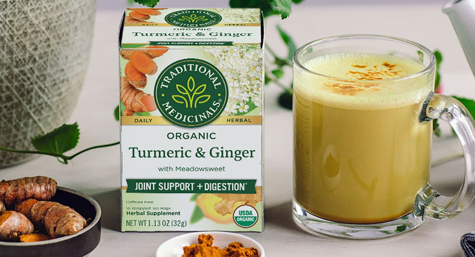 Turmeric milk and tea carton on table